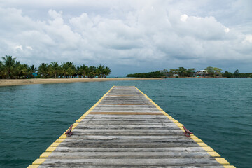 Wooden dock at the harbor of Placencia, Belize