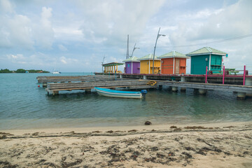 Fototapeta na wymiar Colorful pier at the harbor of Placencia, Belize