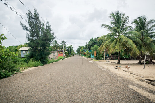 Calm main street through local village in Hopkins, Belize
