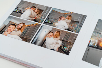a book with photos of couple at home on a white background.