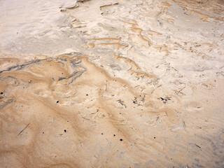 Swirly graphic pattern of sand on a North Carolina Beach