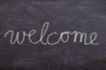 Obraz premium Handwritten chalk welcome sign on blackboard – restaurant and cafe decor