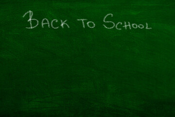 Obraz premium Back to school sig n on chalkboard greenboard blackboard 