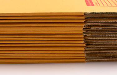 Brown cardboard boxes for packing parcels in online sales placed on a white background.