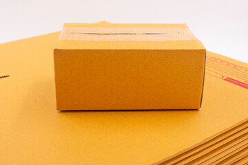 Brown cardboard boxes for packing parcels in online sales placed on a white background.