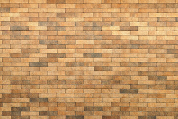 Exterior brick wall. Horizontal masonry.  Yellow brick. Brick textures.