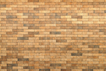 Obraz premium Exterior brick wall. Horizontal masonry. Yellow brick. Brick textures.