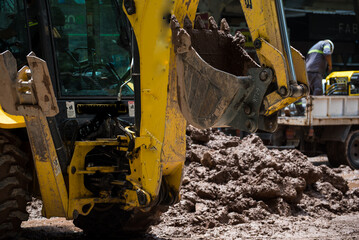 Fototapeta premium tractor parked on stone street