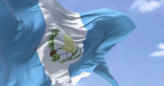 Detail of the national flag of Guatemala waving in the wind on a clear day