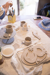 handmade ceramic crafts on a wooden table