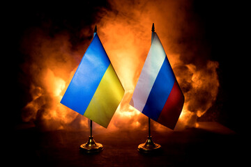 Concept of crisis of war and political conflicts between countries. Russia and Ukraine small flags...