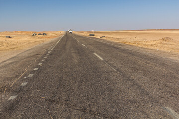 Fototapeta na wymiar Desert road between Cairo and Bahariya oasis, Egypt