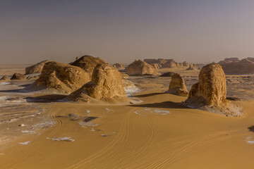 Fototapeta na wymiar Rock formations of El Aqabat (Agabat) valley in the White Desert, Egypt