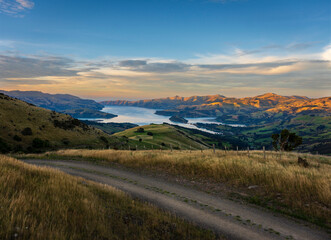 Early Autumn sunrise over Akaroa Harbour, New Zealand