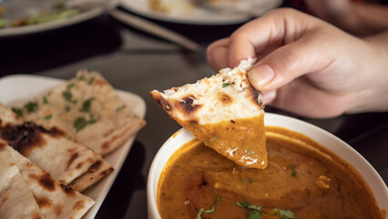 Roti eaten with green curry, Thai and Indian food that get along well