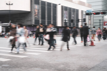 City crosswalk lines and blurred crowd