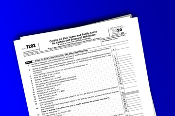 Form 7202 documentation published IRS USA 01.15.2021. American tax document on colored