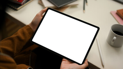 Female using digital tablet touchpad. tablet empty screen mockup.