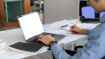 Male accountant is working on notebook laptop