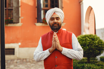 Portrait of Indian sikh man in turban with bushy beard - obrazy, fototapety, plakaty