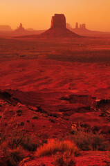 Blood red sunset bathing the buttes and mesas of Monument Valley Navajo Tribal Park from the Artist's Point viewpoint, Arizona, USA