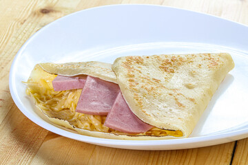 Pancake with ham and cheese