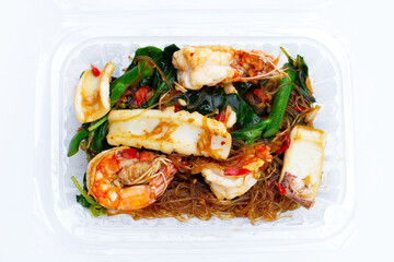 Spicy stir fried vermicelli with holy basil leaves and sea food