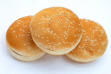 Hamburger buns with sesame on white background.