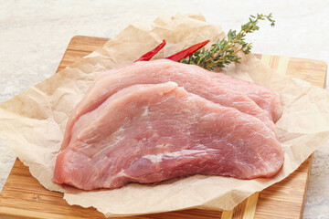 Raw pork schnitzel for roast