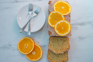 sweet home made orange sponge cake on a table