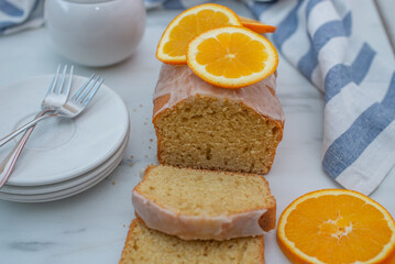 sweet home made orange sponge cake on a table