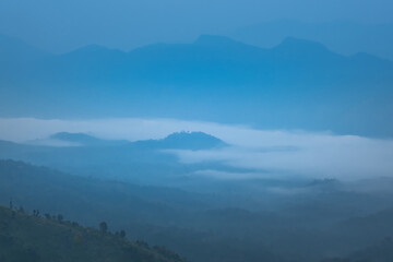 Unseen Beautiful Autumn landscape, sea of clouds coverage the hills during dawn in Sop Moei, Mae Hong Son, Thailand.