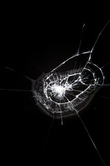 The effect of broken glass, cracks on a black background.