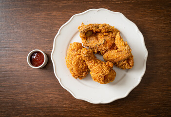 fried chicken with ketchup on plate