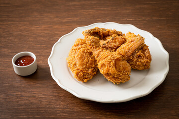 fried chicken with ketchup on plate