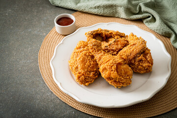 fried chicken with ketchup on plate