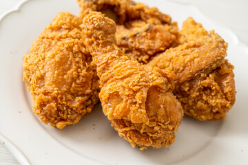 fried chicken with ketchup on plate