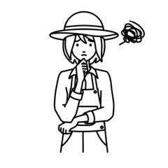 立って手をあごにあてて困っている農家の女性