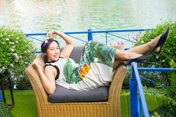 Fototapeta na wymiar person relaxing portrait on a sofa outdoor.
