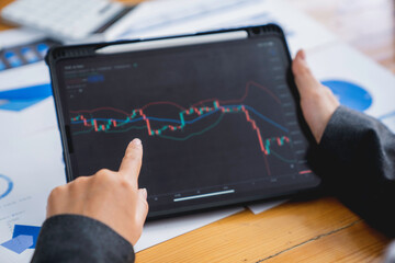 Businessman Working Finance Trading Stock Concept, Investment stock market Entrepreneur Business team discussing and analysis graph stock market trading