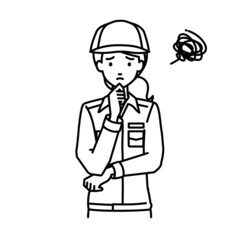 立って手をあごにあてて困っている作業員の女性