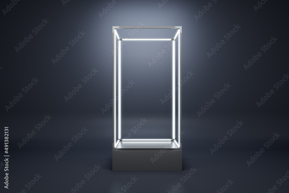 Aufkleber Empty illuminated glass showcase with mock up place on gray wall backdrop. 3D Rendering.