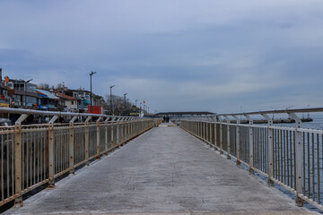 a beautiful coastal road with guardrails