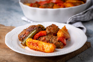 Traditional Homemade Turkish Food Kofte - Kofta with Tomato Sauce and Potatoes. (Turkish name; Izmir kofte)