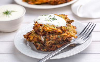 Mucver. Traditional Turkish Zuccini Mucver. Mucver is a Turkish fritter or pancake, made from grated zucchini.