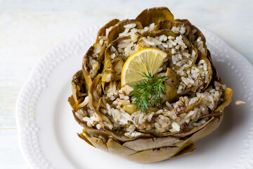 Fresh delicious stuffed artichoke, best Turkish food. Turkish name; Zeytinyagli Enginar Dolmasi