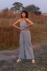 Fototapeta na wymiar Beautiful Young Fashion model posing outdoor in casual garments 
