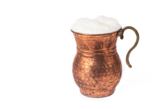Ayran - Traditional Turkish yoghurt drink in a copper cup