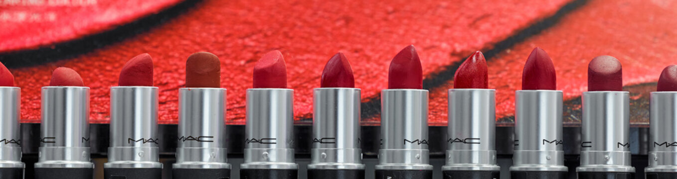 MAC Cosmetics lipstick on the stand. MAC lipstick testers displayed in a luxurious store. Excellent lipstick with a creamy formula, saturated pigments. 12,02,2022, Dubai, UAE