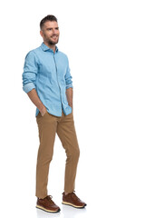 Fototapeta premium bearded middle aged guy in casual outfit holding hands in pockets